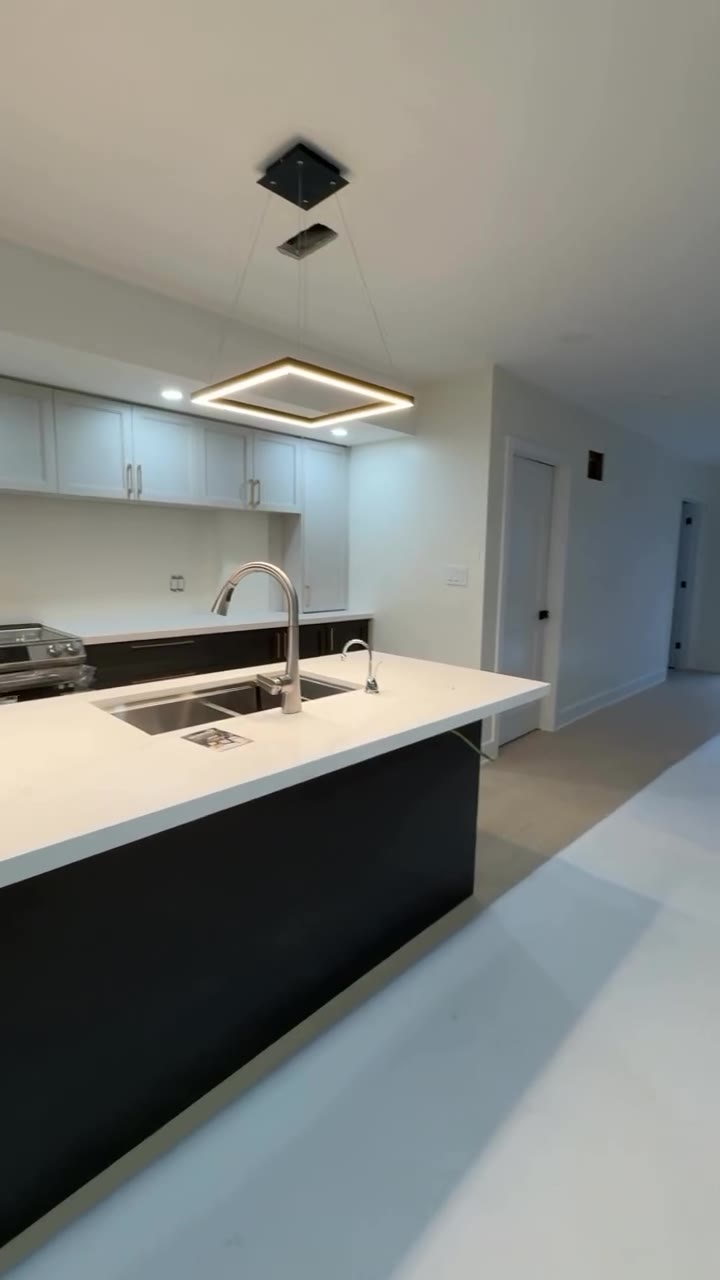Renovated kitchen with integrated LED ceiling lighting