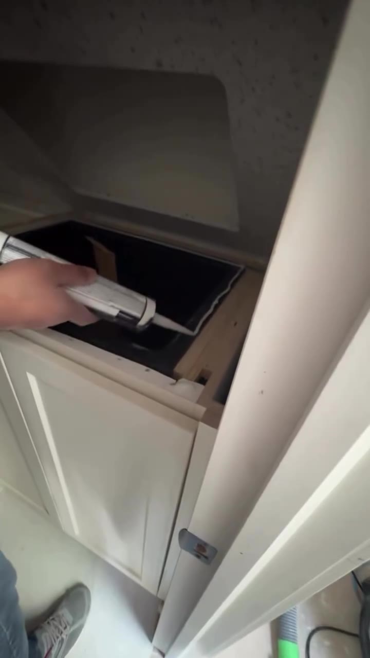 Cabinet drawer hardware during kitchen installation