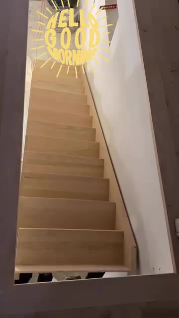 Unfinished wood staircase during construction