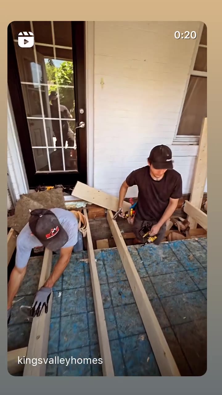 Crew framing a new floor structure